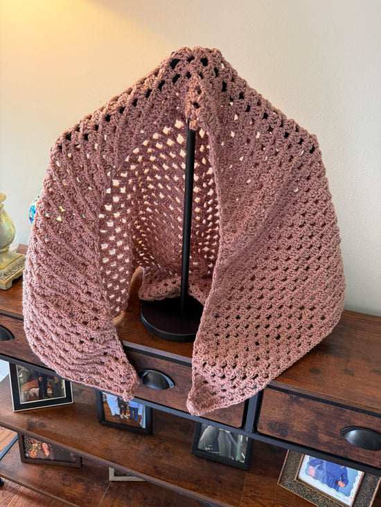 Hand crocheted shawl in rose color.