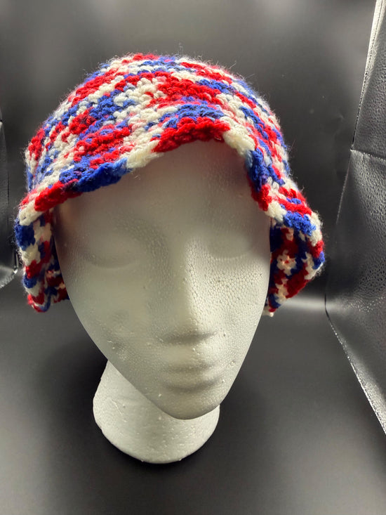 Hand made crocheted bucket hat made with red, white and blue cotton yarn